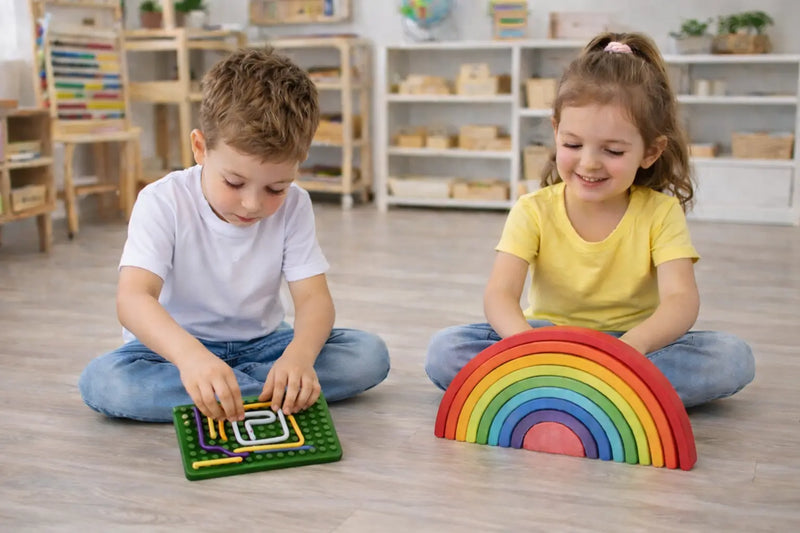 Two children developing concentration and problem-solving skills through hands-on educational play.