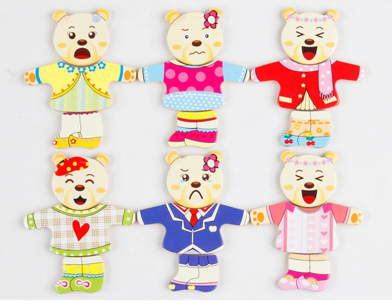 Set of colourful bear-shaped toys with different outfits