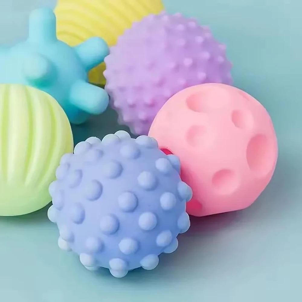 Colourful textured balls on a light blue background