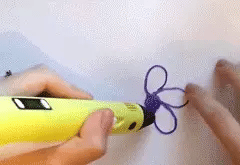 3D pen creating shapes with colourful filament