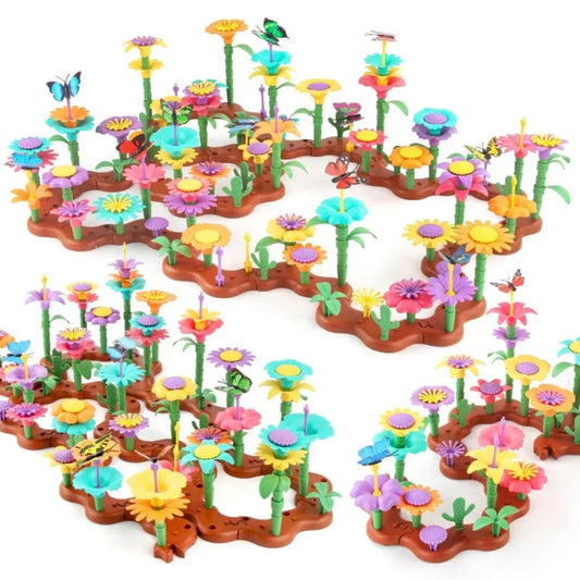 Colourful toy garden set with flowers and butterflies 