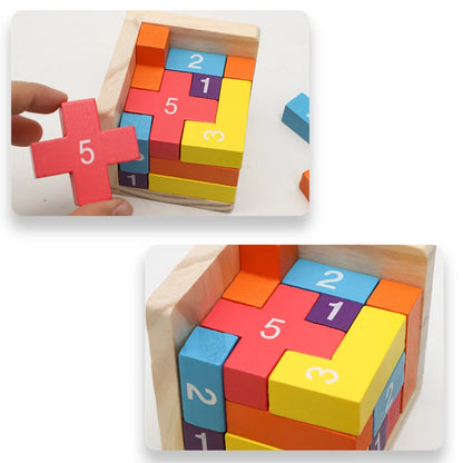 Colourful wooden puzzle with numbers, being assembled by a hand.