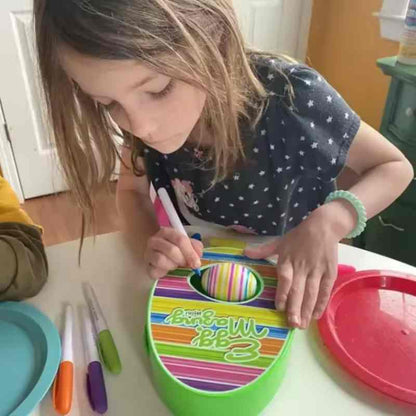 Child using the Egg Decorator Easter kit