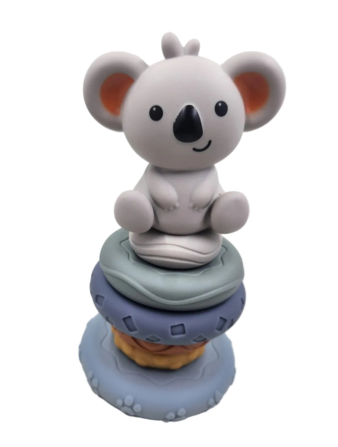 Koala figurine on a stack of colourful rings 