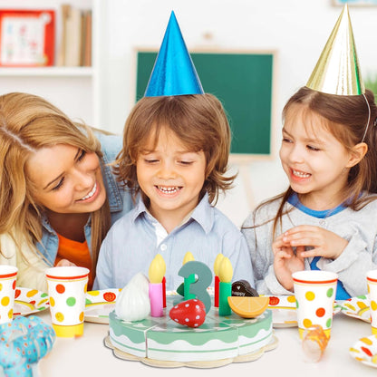 Children celebrating a birthday with a cake and candles, wearing party hats.