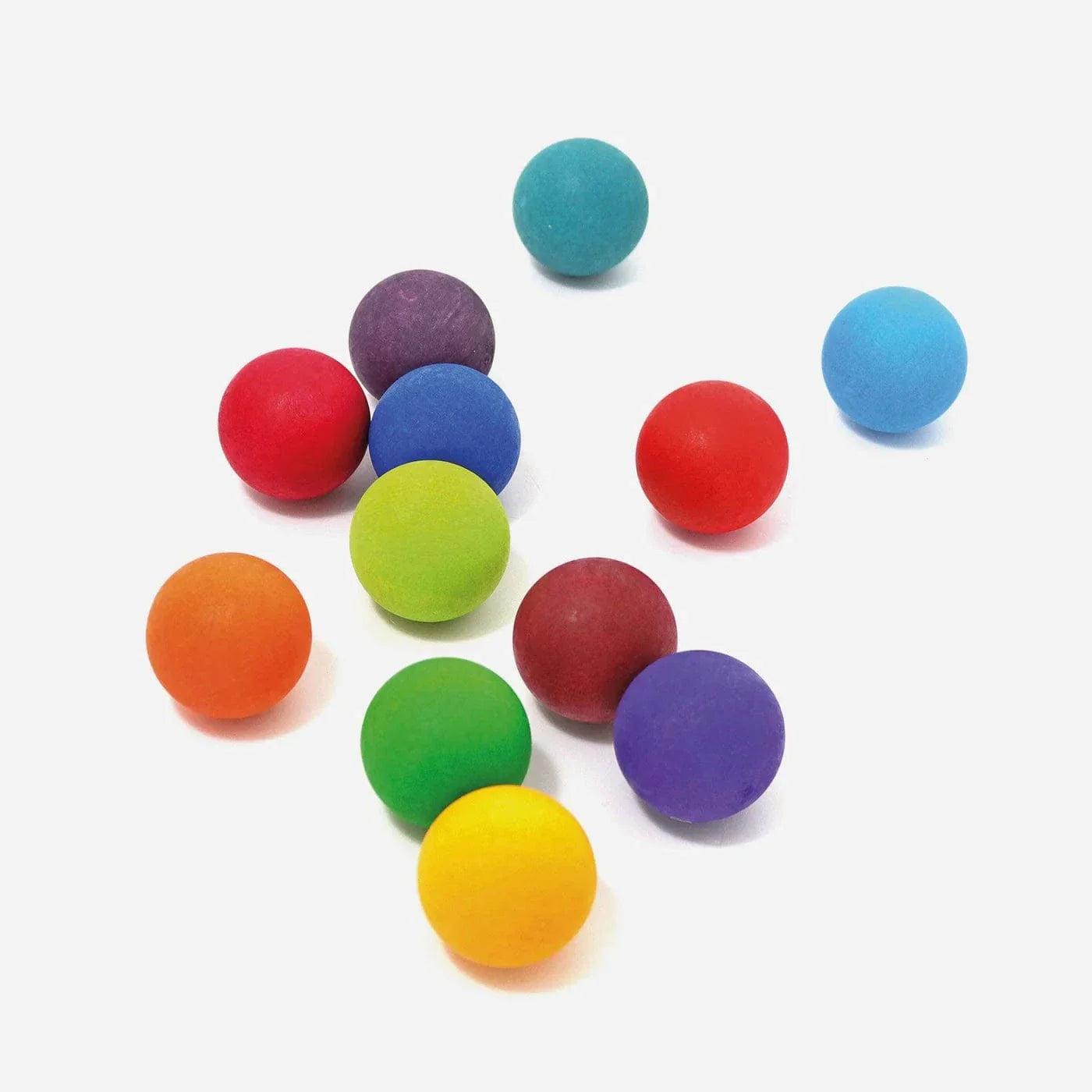 Creative Montessori play with wooden rainbow balls