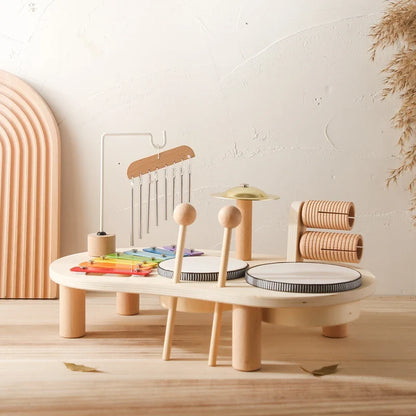 Toddler playing independently with Montessori music table