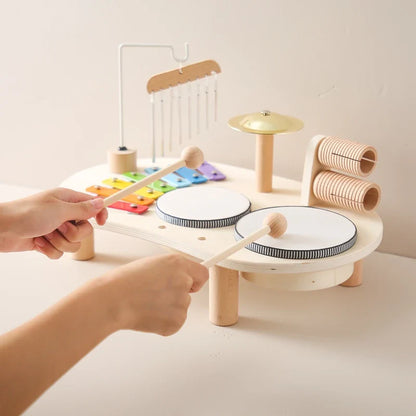 Wooden Montessori music table with xylophone drums and harp