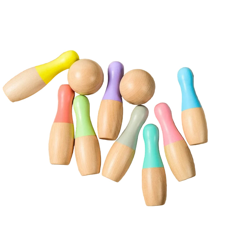 Set of colourful wooden bowling pins 