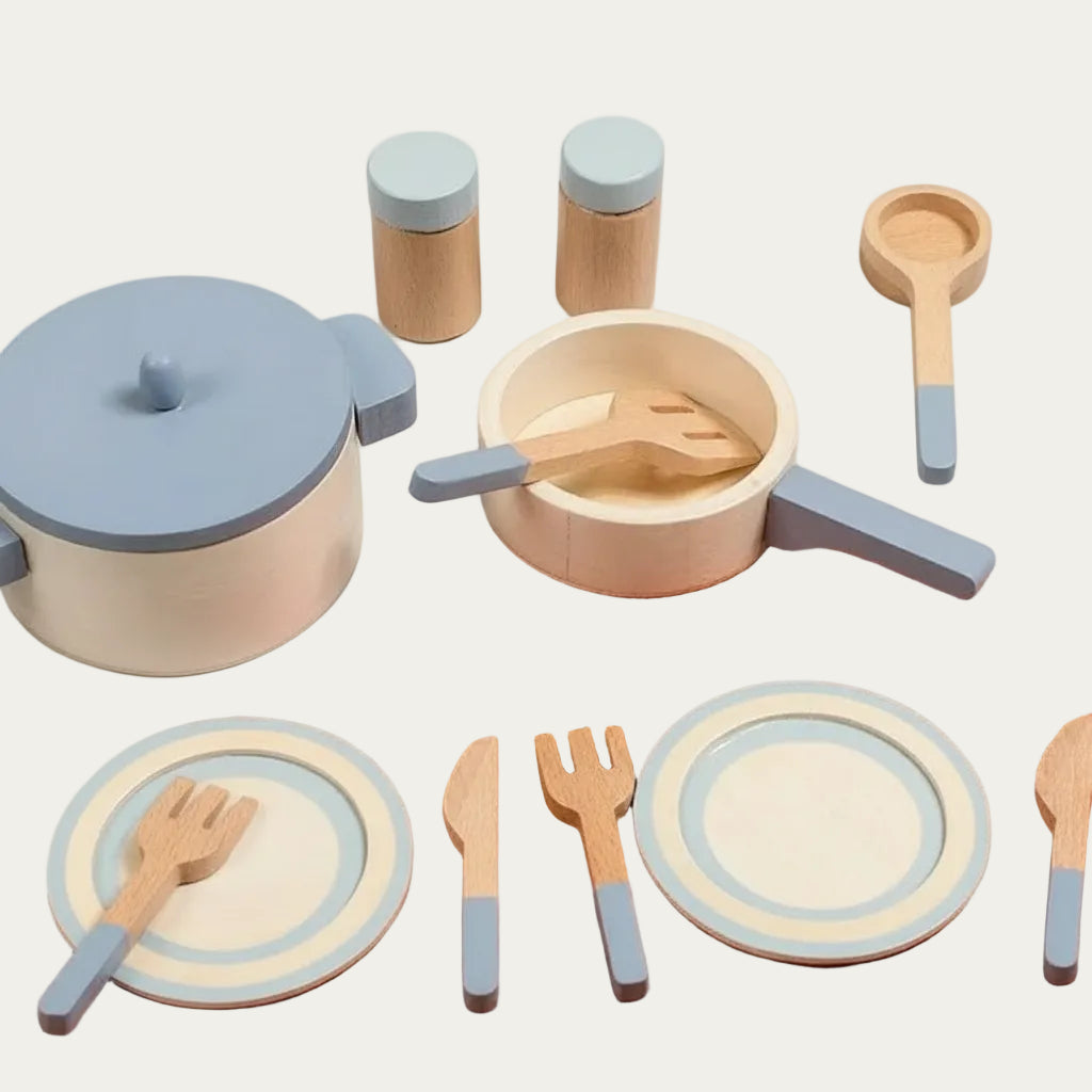 Set of wooden kitchen toys with pots, pans, and utensils 