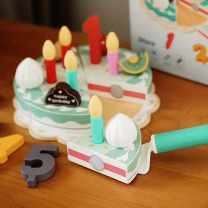 Toy birthday cake with candles 