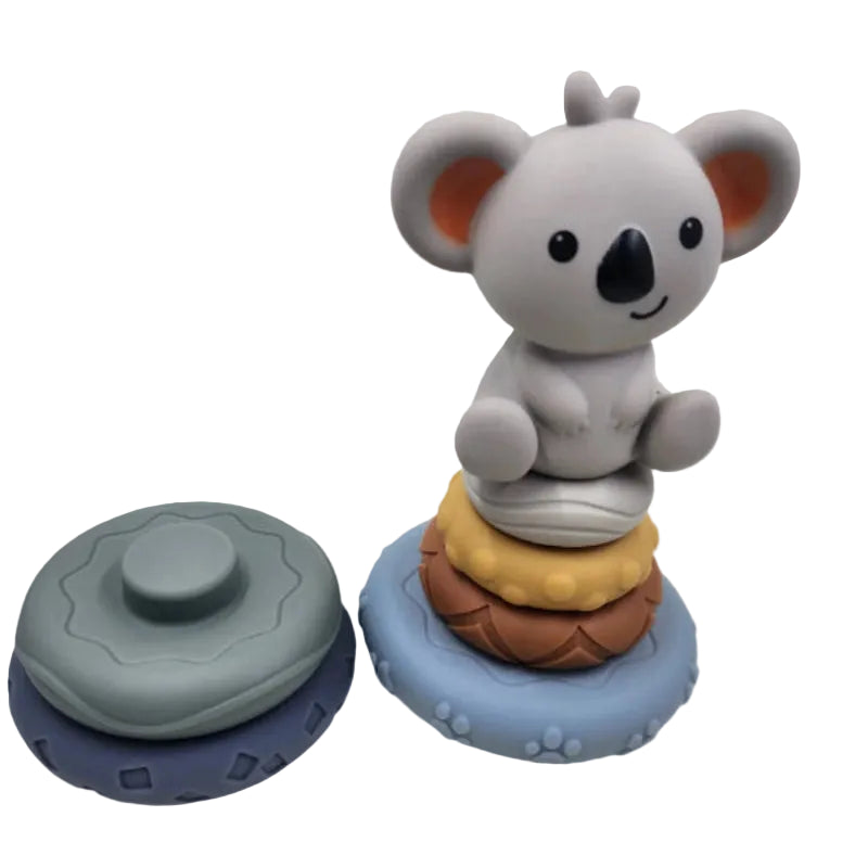 Toy figure of a koala on colourful stacked rings 
