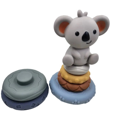 Toy figure of a koala on colourful stacked rings 