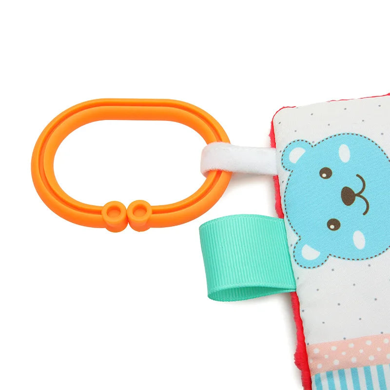 Toy with a bear design and colourful clip 