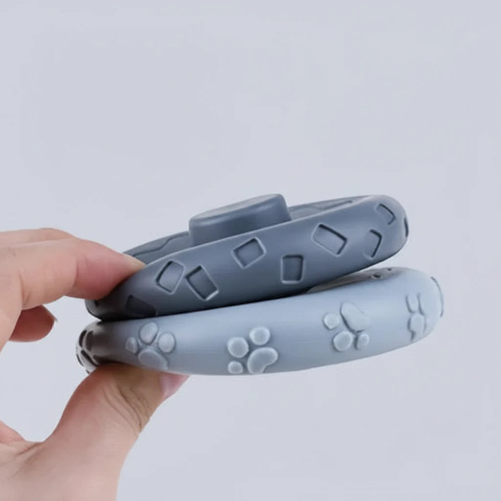 Soft silicone stacking rings being held in a baby's hand