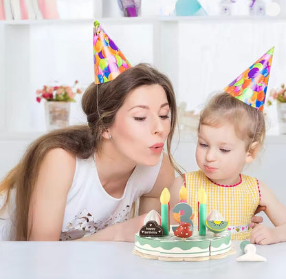 Parent and child playing with wooden birthday cake pretend play set