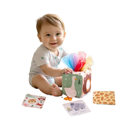 Baby reaching for and exploring the Montessori sensory tissue box