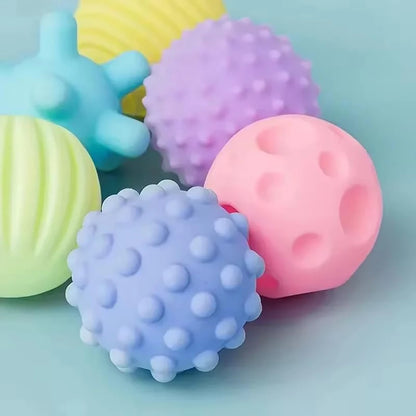 Colourful textured balls on a light blue background