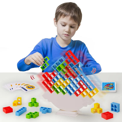 Child playing with Tetra Tower balancing blocks